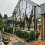 custom designed aluminium facade shop front and windows by Paul Evans, Yorkshire, garden centre architecture