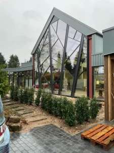 custom designed aluminium facade shop front and windows by Paul Evans, Yorkshire, garden centre architecture
