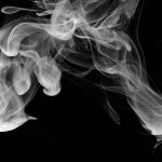 A room filled with smoke. Ensuring Compliance with EN 12101-2: A Guide for Landlords.